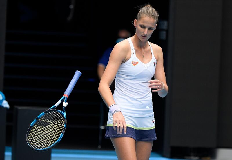 Karolina Pliskova of the Czech Republic throws her racket in frustration during her third-round defeat against compatriot Karolina Muchova. AP