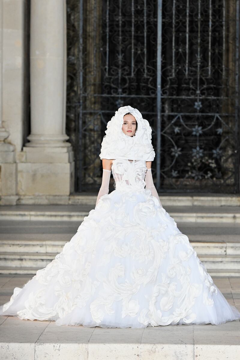 Bridal-esque gowns were covered in three-dimensional blooms.