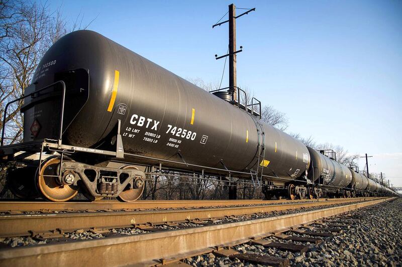 A crude oil train is parked outside the Philadelphia Energy Solutions refinery owned by the Carlyle Group. David Parrott / Reuters