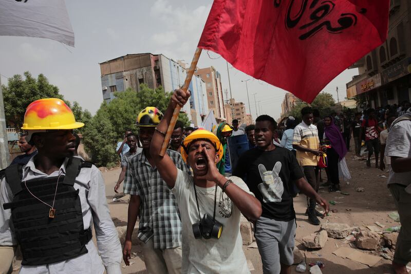 Anti-military protesters march in Khartoum, Sudan, a day after nine people were killed in demonstrations against the country’s ruling generals. AP 