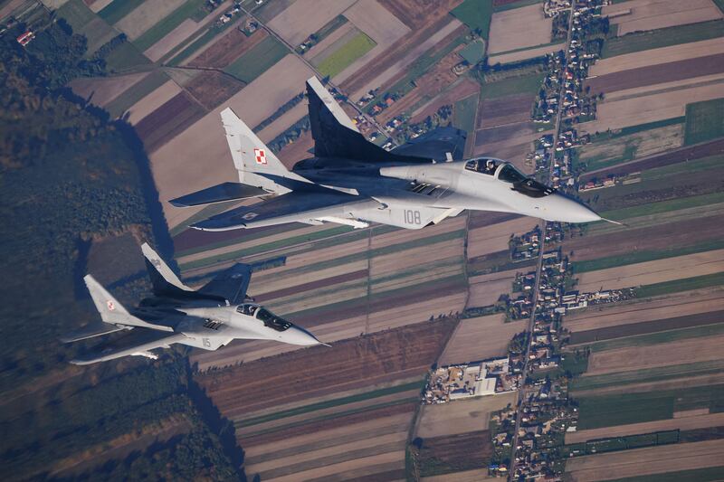 Two MiG-29 fighter jets take part in the Nato Air Shielding exercise near an air base in Lask, Poland, in October 2022. AFP