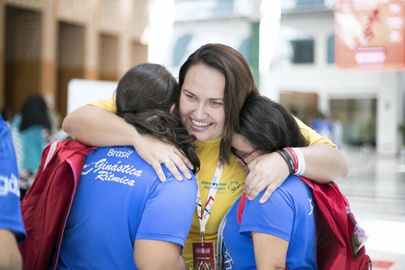 ABU DHABI, UNITED ARAB EMIRATES - March 20 2019.

Brazil's bocce athlete Sarah Berto embraces her teammates  at the Special Olympics World Games in ADNEC.


 (Photo by Reem Mohammed/The National)

Reporter: 
Section:  NA