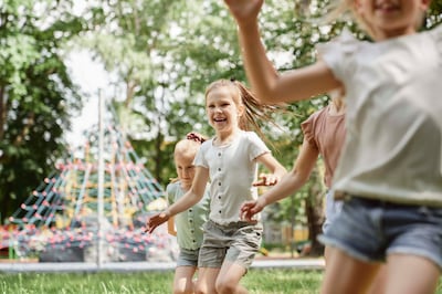 Parents and teachers have spoken about the benefits of opening the back door and letting her kids create their own fun outside. Getty Images