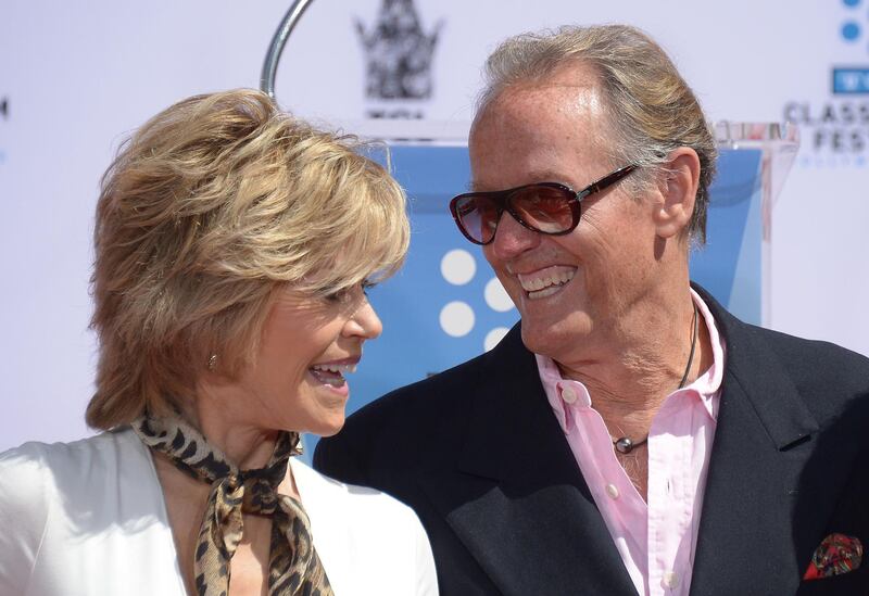 Peter Fonda attends his sister's hand and footprint ceremony in 2013. AFP.
