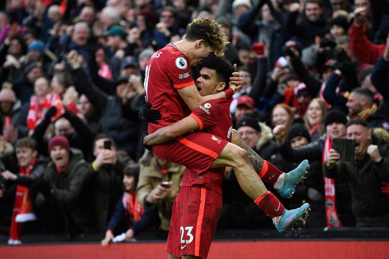 Liverpool Luis Diaz, right, with Kostas Tsimikas after scoring the third goal. AFP
