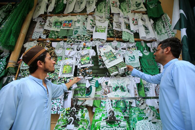 Patriotic clothing and items for sale at a market in Peshawar. EPA