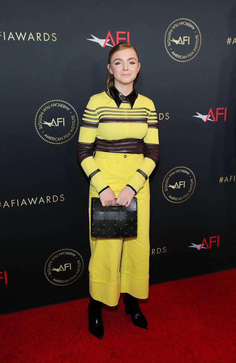 15-year-old actress Elsie Fisher ('Eighth Grade') brightens up the red carpet in an eye-catching yellow ensemble. REUTERS