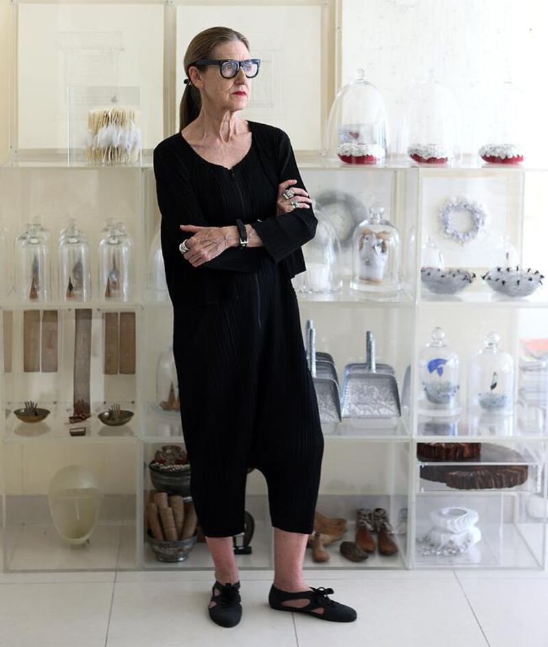 The British artist Patricia Millns in her Dubai studio with some of her minimalist sculptures, largely in whites and greys. Satish Kumar / The National
