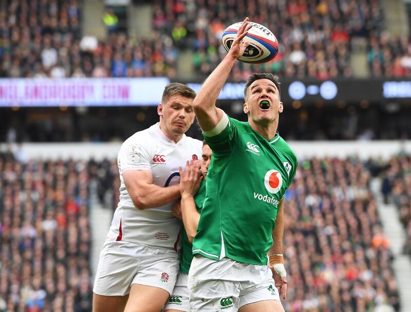 epa08242326 Ireland's Jonathan Sexton (R) in action during the Six Nations rugby match between England and Ireland at Twickenham stadium in London, Britain, 23 February 2020.  EPA/FACUNDO ARRIZABALAGA