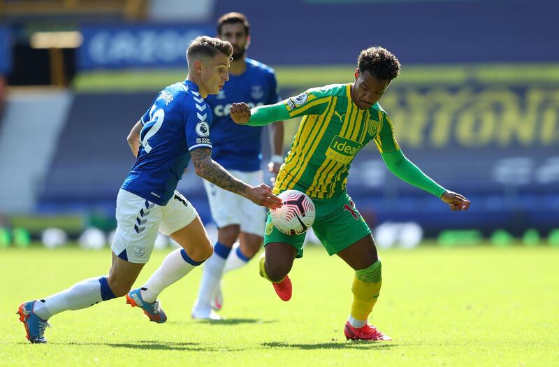 Lucas Digne of Everton  battles for possession with  Matheus Pereira of West Bromwich Albion at Goodison Park on Saturday. Getty