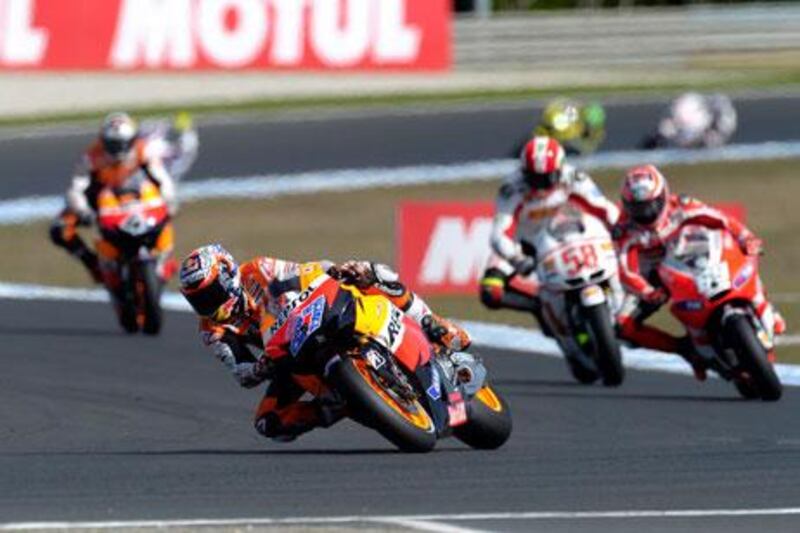 Casey Stoner rode to a second consecutive title on Sunday to celebrate his birthday at Phillip Island in the Australian MotoGP race.