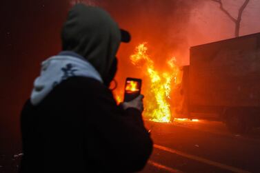 One group of anarchists ransacked the branch office of a bank. EPA