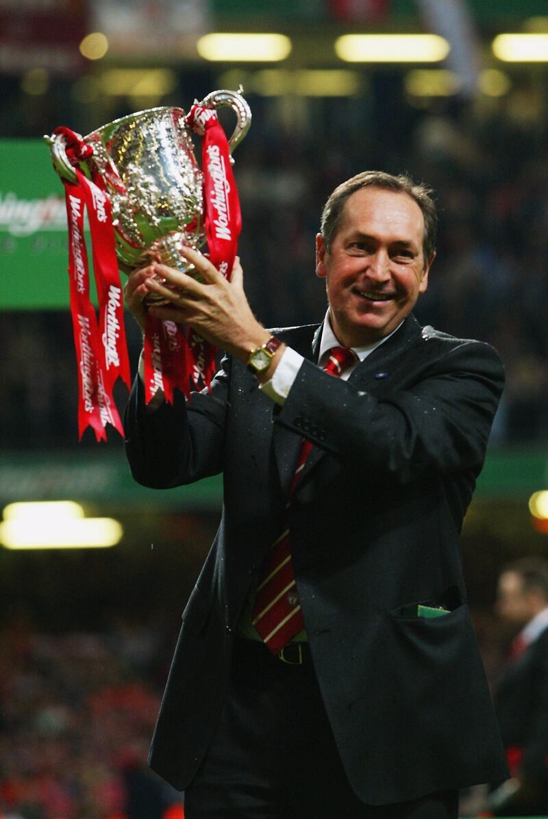CARDIFF - MARCH 2:  Liverpool manager Gerard Houllier poses with the trophy after the Worthington Cup Final between Liverpool and Manchester United held on March 2, 2003 at the Millennium Stadium, in Cardiff, Wales. Liverpool won the match and final 2-0. (Photo by Ben Radford/Getty Images)