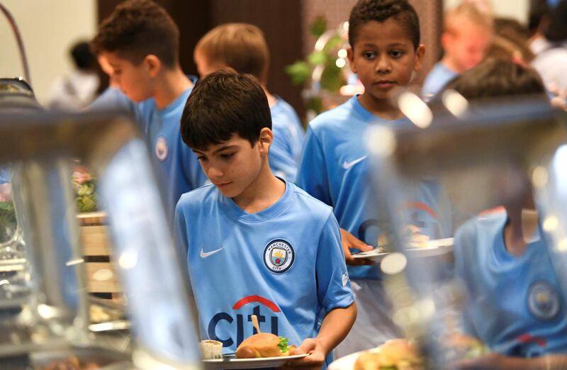 Abu Dhabi, United Arab Emirates - Game screening of Manchester City vs. Brighton Albion football match along with an Iftar buffet at Mubadala Arena, Zayed Sports City. Khushnum Bhandari for The National
