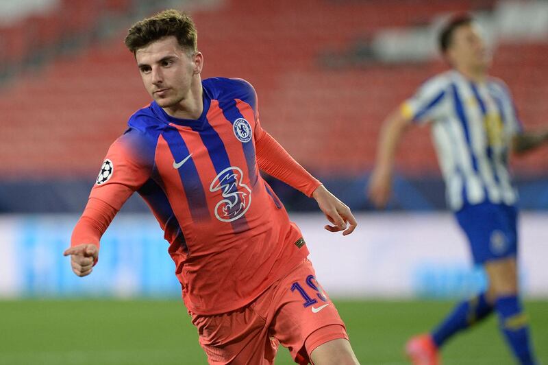 Chelsea's English midfielder Mason Mount celebrates scoring a goal during the UEFA Champions League first leg quarter final football match between FC Porto and Chelsea FC at the Ramon Sanchez Pizjuan stadium in Seville on April 07, 2021. (Photo by CRISTINA QUICLER / AFP)