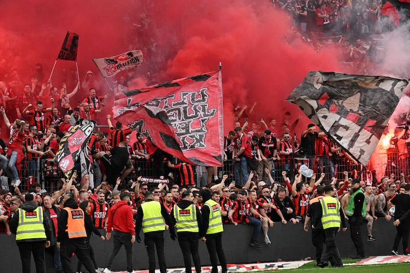 Leverkusen fans celebrate winning the league title. AFP