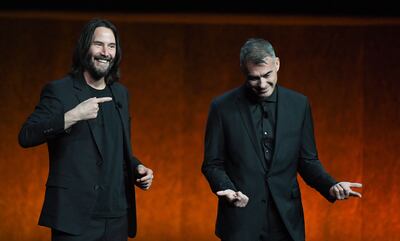 Chad Stahelski on stage with John Wick star Keanu Reeves at CinemaCon last year. AFP 