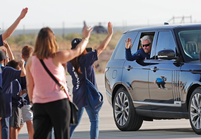 Mr Branson is driven to the rocket plane at Spaceport America, near the city of Truth or Consequences, New Mexico.