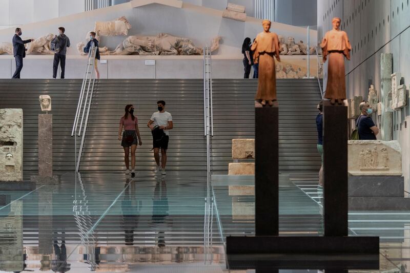 People visit the Acropolis Museum, as museums open following the easing of measures against the spread of the coronavirus disease in Athens, Greece. Reuters