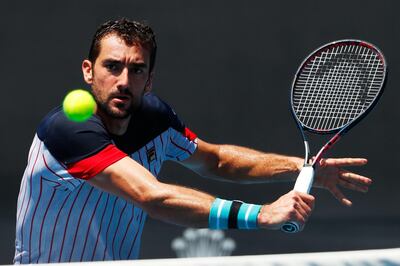 MELBOURNE, AUSTRALIA - JANUARY 27:  Marin Cilic of Croatia plays a backhand during a practice session on day 13 of the 2018 Australian Open at Melbourne Park on January 27, 2018 in Melbourne, Australia.  (Photo by Michael Dodge/Getty Images)