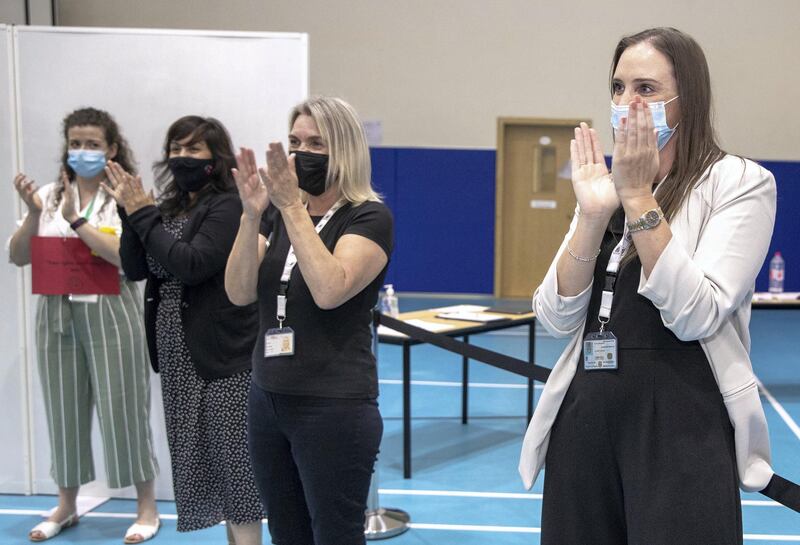 Abu Dhabi, United Arab Emirates, March 3, 2021.  Pupils receive some of their IGCSE and International A-level results for January session 2021. Pupils celebrating after recieving receiving results.
Victor Besa / The National
Section:  NA
Reporter:  Anam Rizvi