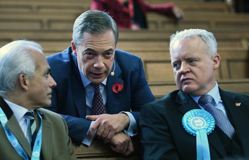 epa07972153 Brexit Party leader Nigel Farage speaks with Brexit Party parliamentary candidates at a Brexit Party rally in central London, Britain, 04 November 2019. Britons go the polls 12 December in a general election.  EPA/ANDY RAIN