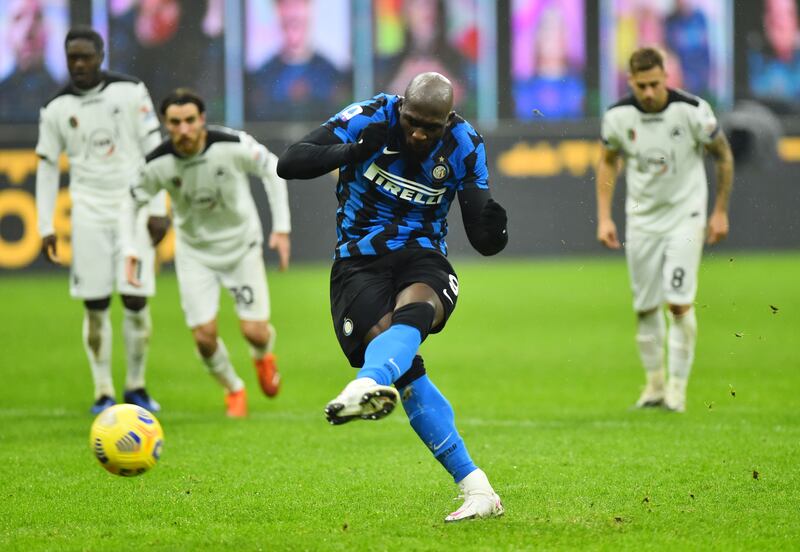 Soccer Football - Serie A - Inter Milan v Spezia - San Siro, Milan, Italy - December 20, 2020 Inter Milan's Romelu Lukaku scores their second goal from the penalty spot REUTERS/Massimo Pinca