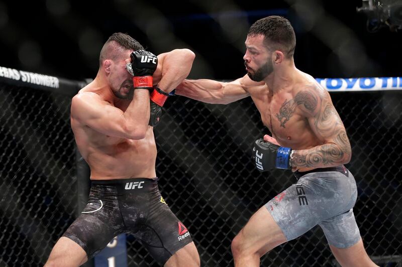 Mirsad Bektic, left, and Dan Ige during their featherweight bout at UFC 247 in Houston. AP