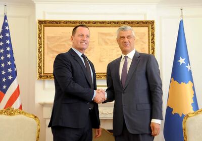 FILE PHOTO: U.S. special envoy Richard Grenell is welcomed by Kosovo President Hashim Thaci in Pristina, Kosovo, October 9, 2019.  REUTERS/Laura Hasani/File Photo