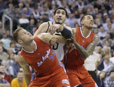 Basketball star Enes Kanter, centre, has openly supported the Gulen movement. AP Photo