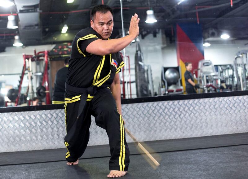 Dubai UNITED ARAB EMIRATES - Guro Omar , a Filipino eskrima giving instructions to his students at Power Gym in Dubai.  Ruel Pableo for The National for Nick's story