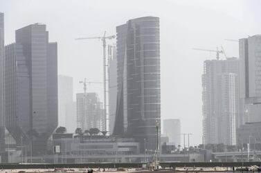 A haze of fog descended over Abu Dhabi on Sunday. Antonie Robertson / The National