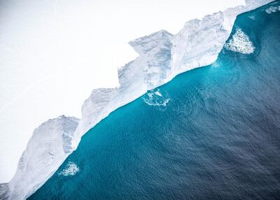 A handout photograph released by the UK Ministry of Defence (MOD) on December 5, 2020 shows one of the largest recorded icebergs, the 4,200-sq-km block known as A68a, floating near the island of South Georgia, South Atlantic and revealing the steep vertical sides, approximately 30m high.
  The image, taken from an A400M Atlas, Royal Air Force aircraft shows the first photographic evidence of this gigantic mass of ice that has transited from Antartica.  - RESTRICTED TO EDITORIAL USE - MANDATORY CREDIT  " AFP PHOTO / UK MOD / CROWN COPYRIGHT 2019/ CORPORAL PHIL DYE"  -  NO MARKETING NO ADVERTISING CAMPAIGNS   -   DISTRIBUTED AS A SERVICE TO CLIENTS  -  NO ARCHIVE - TO BE USED WITHIN 2 DAYS FROM DECEMBER 5 (48 HOURS), EXCEPT FOR MAGAZINES WHICH CAN PRINT THE PICTURE WHEN FIRST REPORTING ON THE EVENT
 / AFP / MOD / Handout / RESTRICTED TO EDITORIAL USE - MANDATORY CREDIT  " AFP PHOTO / UK MOD / CROWN COPYRIGHT 2019/ CORPORAL PHIL DYE"  -  NO MARKETING NO ADVERTISING CAMPAIGNS   -   DISTRIBUTED AS A SERVICE TO CLIENTS  -  NO ARCHIVE - TO BE USED WITHIN 2 DAYS FROM DECEMBER 5 (48 HOURS), EXCEPT FOR MAGAZINES WHICH CAN PRINT THE PICTURE WHEN FIRST REPORTING ON THE EVENT
