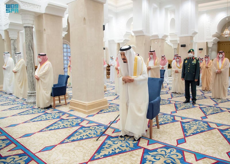 Saudi's King Salman performs prayers for Eid al-Fitr. SPA