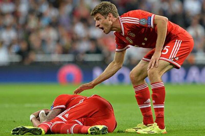 Thomas Mueller is trying to raise his Bayern Munich side's spirits. Peter Kneffel / EPA