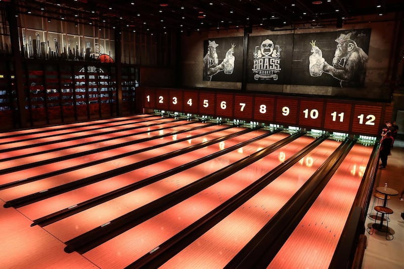 DUBAI, UNITED ARAB EMIRATES , September 27 – 2020 :- View of the 12 bowling lanes at the Brass Monkey, new dining and entertainment destination on the Bluewaters Island in Dubai.  (Pawan Singh / The National) For Lifestyle/Online/Instagram. Story by Janice Rodrigues 