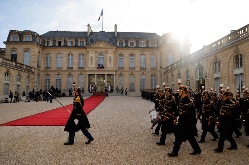 The Republican Guard Orchestra prepares for the arrival at the Elysee Palace. AFP