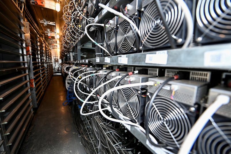A bank of cryptocurrency miners operates at the Scrubgrass Plant in Kennerdale, Pennsylvania. The mining process results in high energy usage. Reuters