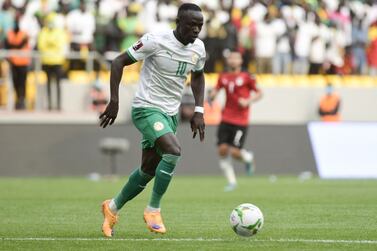 Senegal's Sadio Mane controls the ball during the World Cup 2022 qualifying football match between Senegal and Egypt at the  Me Abdoulaye Wade Stadium in Diamniadio on March 29, 2022.  (Photo by SEYLLOU  /  AFP)