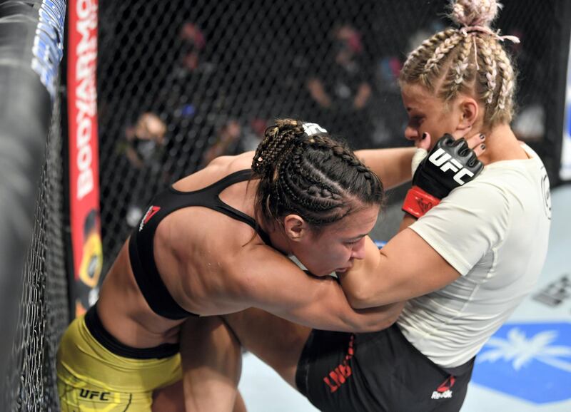 ABU DHABI, UNITED ARAB EMIRATES - JULY 12: (R-L) Paige VanZant knees Amanda Ribas of Brazil in their flyweight fight during the UFC 251 event at Flash Forum on UFC Fight Island on July 12, 2020 on Yas Island, Abu Dhabi, United Arab Emirates. (Photo by Jeff Bottari/Zuffa LLC)