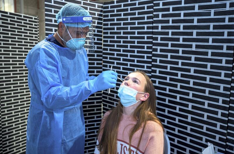 Abu Dhabi, United Arab Emirates, March 18, 2021.  Georgia Andrews, 16, gets a PCR test at the Biogenix lab at G42 in Masdar City.
Victor Besa/The National
Section:  NA
Reporter:  Shireena Al Nowais