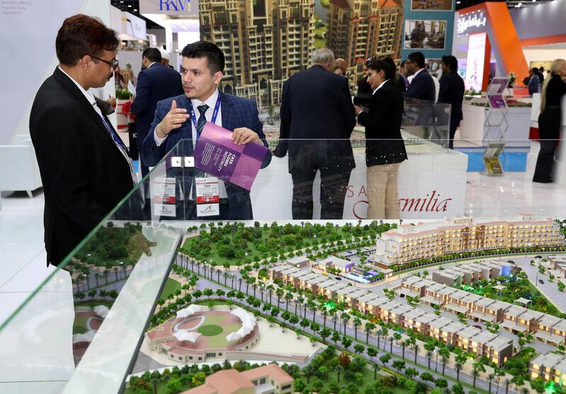 Dubai, United Arab Emirates - September 11th, 2017: Visitors at the Casa Flores Motor city project by National bonds at the 16th addition of Cityscape Global. Monday, September 11th, 2017 at World Trade centre, Dubai. 