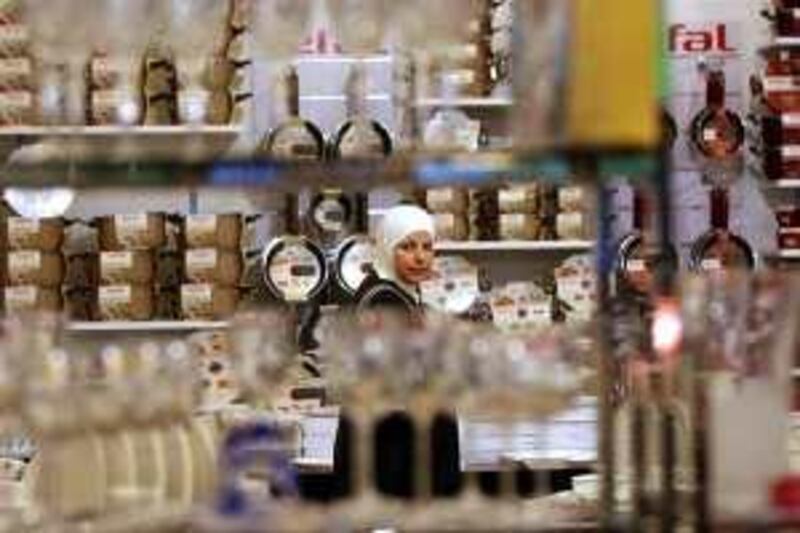 epa01807242 Palestinian customers seen during the inauguration of a Shopping Mall, called Herbawi home center, 26 July 2009, in the West Bank town of Ramallah. The United States has transferred 200 million dollars in aid to the Palestinian Authority to help it fill a serious budget shortfall, US Secretary of State Hillary Rodham Clinton announced 24 July. The money is part of a 900-million-dollar aid pledge to the

Palestinians made by Clinton at an Arab summit earlier this year. Clinton said economic development was critical to achieving peace between the Israelis and Palestinians.  EPA/ATEF SAFADI *** Local Caption ***  01807242.jpg *** Local Caption ***  01807242.jpg