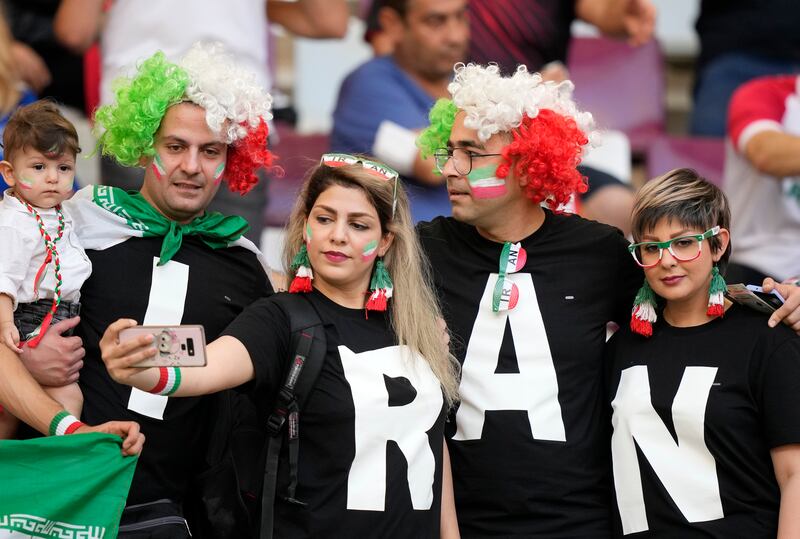 These Iranian fans spell it out before the match against England. AP