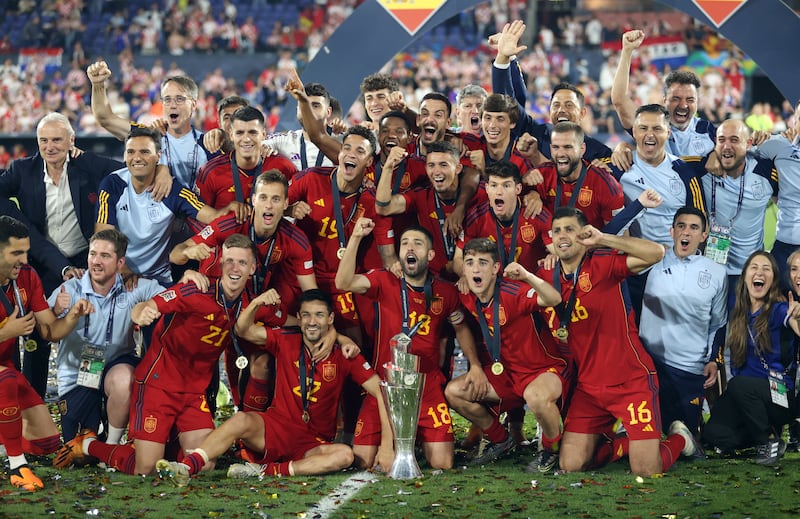 Jordi Alba and teammates of Spain pose for a photo with the Uefa Nations League trophy following victory in the UEFA Nations League 2022/23 final match between Croatia and Spain at De Kuip on June 18, 2023 in Rotterdam, Netherlands. Getty Images
