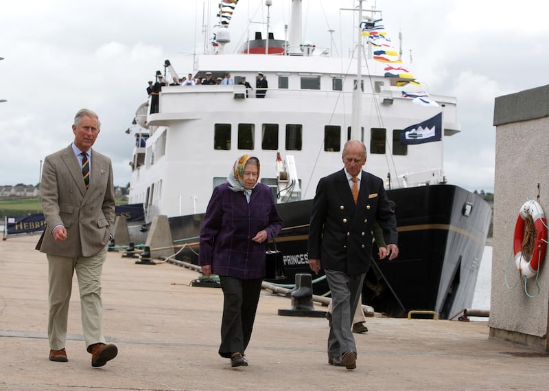 The queen, Prince Philip and Prince Charles leave the 'Hebridean Princess' boat after a family holiday around the Western Isles of Scotland, in Scrabster in 2010. 