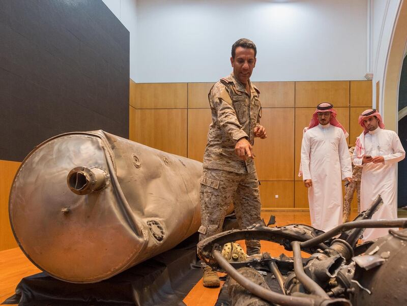 Saudi-led coalition spokesman Colonel Turki Al-Malki giving explanations during a press conference, in Riyadh, on the displayed missile debris fired on March 28 by the Yemeni Houthi military group and intercepted by Riyadh. AFP