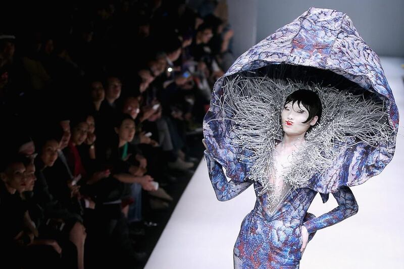 A model showcases designs on the runway at Hu Sheguang Collection show during Mercedes-Benz China Fashion Week Spring/Summer 2015 at Beijing Hotel on October 31, 2014 in Beijing, China. Leng Li / Getty Images
