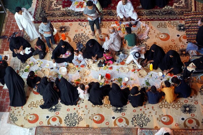 An Iraqi family breaks fast during the month of Ramadan in Hilla, Iraq. Reuters