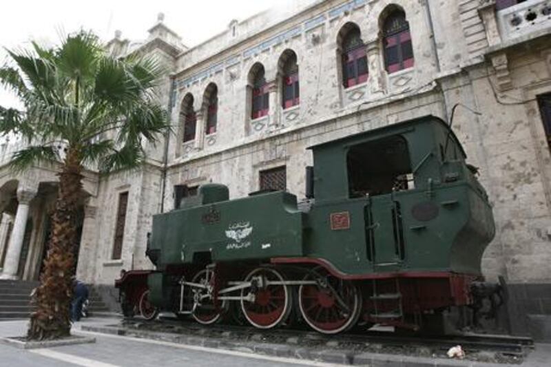 An old locomotive sits outside the Hejaz rail station in old Damascus on February 23, 2010. The Hejaz railway ran from Damascucs to Medina in Saudi Arabia and was part of the Ottoman railway network. AFP PHOTO/LOUAI BESHARA